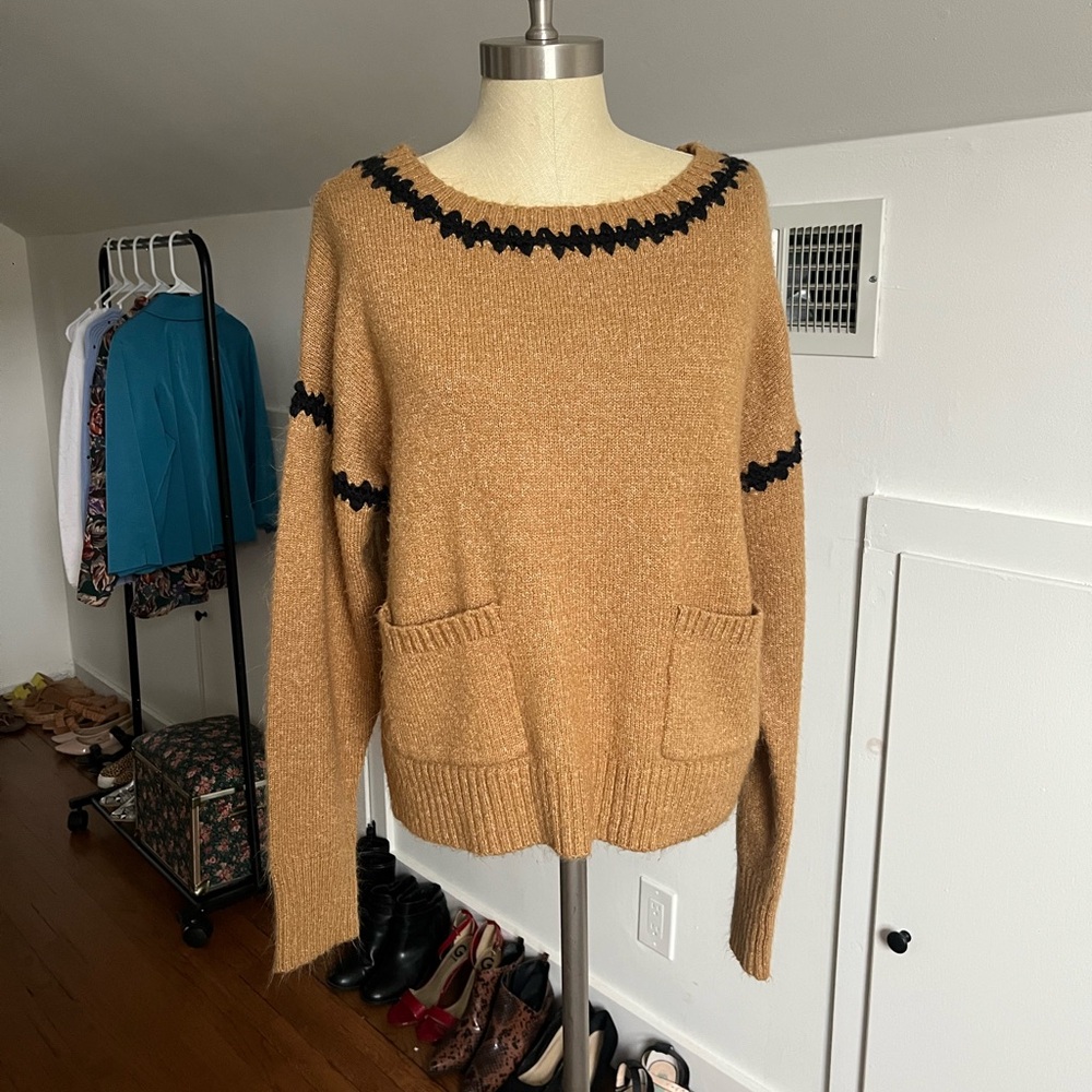 Tan and black sweater with pockets